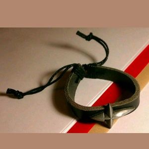 SILVER GREY THICK POINTED CROSS ADJ BLACK BRACELET